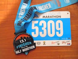 Oddly enough, this medal was bigger than our full marathon finisher medal.