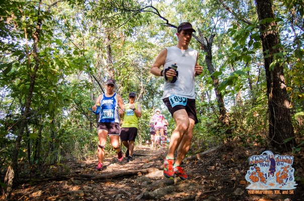 I might not be a very photogenic runner, but I love this pic. Why? Because it's proof I'm ahead of Jason :)