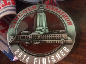 It's a very nice finisher medal. I was surprised though it said Lincoln Marathon not Half Marathon on it. In KC, the shirt says Kansas City Marathon but lists the other distances on it. Also, the medals are different for each one. It's not a big deal, but I don't like taking credit for running a full when I did a half. The full marathoners are amazing and deserve credit for going all the way!